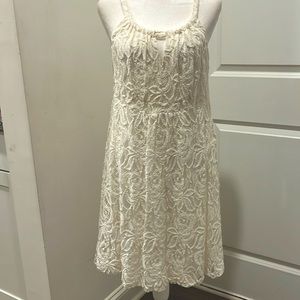 White Cotton Dress made by INC (Macy’s brand) in a size medium. New with Tags.
